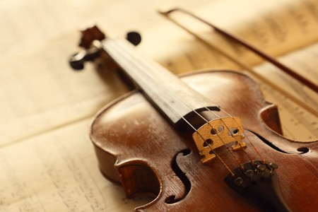 Violin and bow and music